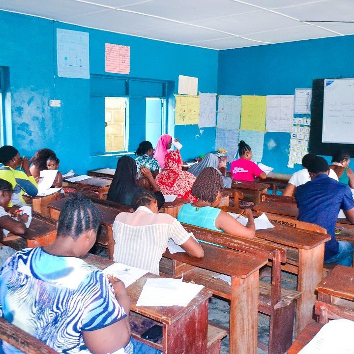 Students in classroom, learning english and business skills, Nigeria