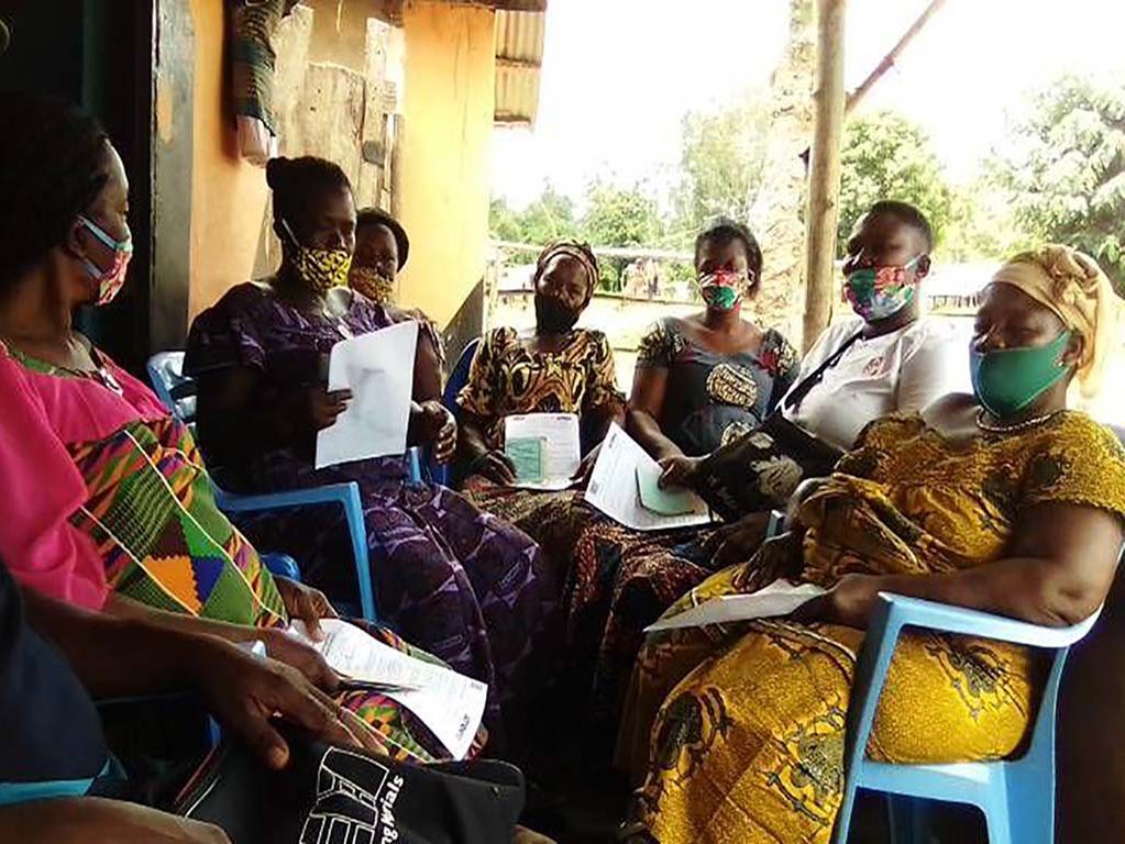 A group of women in Togo village learning about starting a business