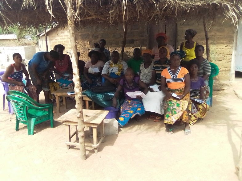 A group of women attending a worskhop for starting a business, in a Togo village